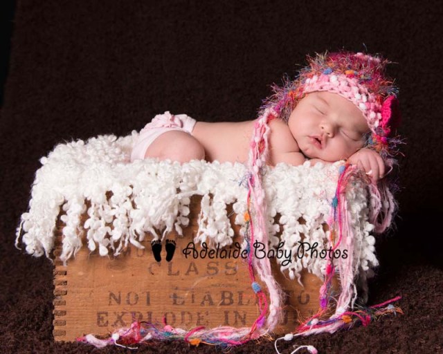 Photo of sleeping baby in box by Adelaide Baby Photos