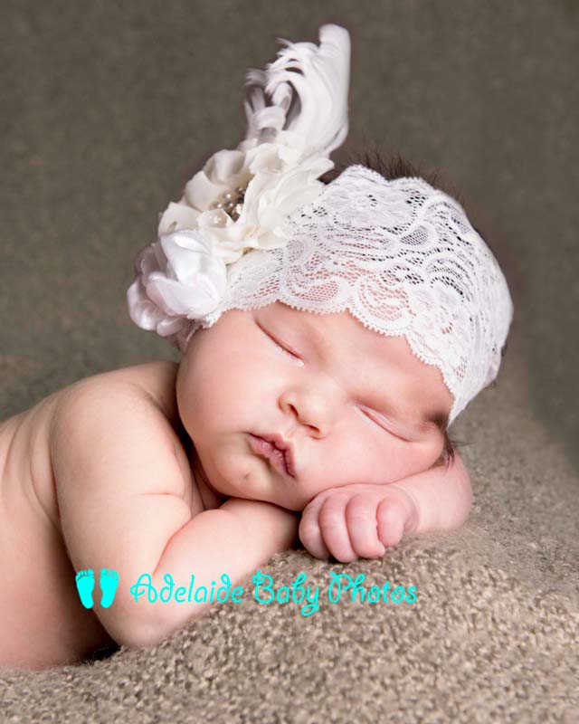 Photo of sleeping newborn baby by Adelaide Baby Photos